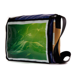Upcycling shoulder bag with transparent slip-in compartment